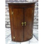 18TH CENTURY OAK & MAHOGANY CROSS BANDED BOWFRONT HANGING CORNER CUPBOARD, 103cms high