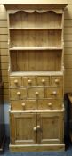 MODERN PINE WATERFALL DRESSER, fitted with 'spice' drawers and cupboards, 79 x 36 x 200cms