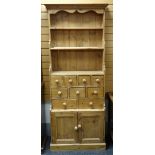 MODERN PINE WATERFALL DRESSER, fitted with 'spice' drawers and cupboards, 79 x 36 x 200cms