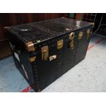 VINTAGE STEAMER TRUNK with brass plated locks and corner clasps, leather handles