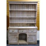 VICTORIAN STRIPPED PINE 'DOG KENNEL' DRESSER, with boarded rack, on base with three frieze drawers
