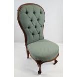 VICTORIAN WALNUT NURSING CHAIR, button upholstered balloon back, stuff-over seat, scrolled legs,