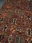 VINTAGE PERSIAN BAKTIAR VILLAGE CARPET, heavy pile wool, with compartmented design of flowers,