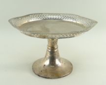 GEORGE V SILVER PEDESTAL COMPORT of pierced hexagonal form raised on circular base, Birmingham 1910,