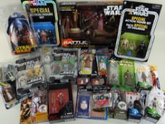 ASSORTED HASBRO & OTHER STAR WARS FIGURINES & TOYS, including two carded action figure sets and a