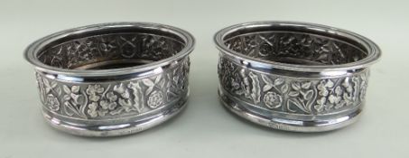 PAIR OF SILVER BOTTLE COASTERS, Commemorating the Queen's Silver Jubilee 1952-1977, with turned