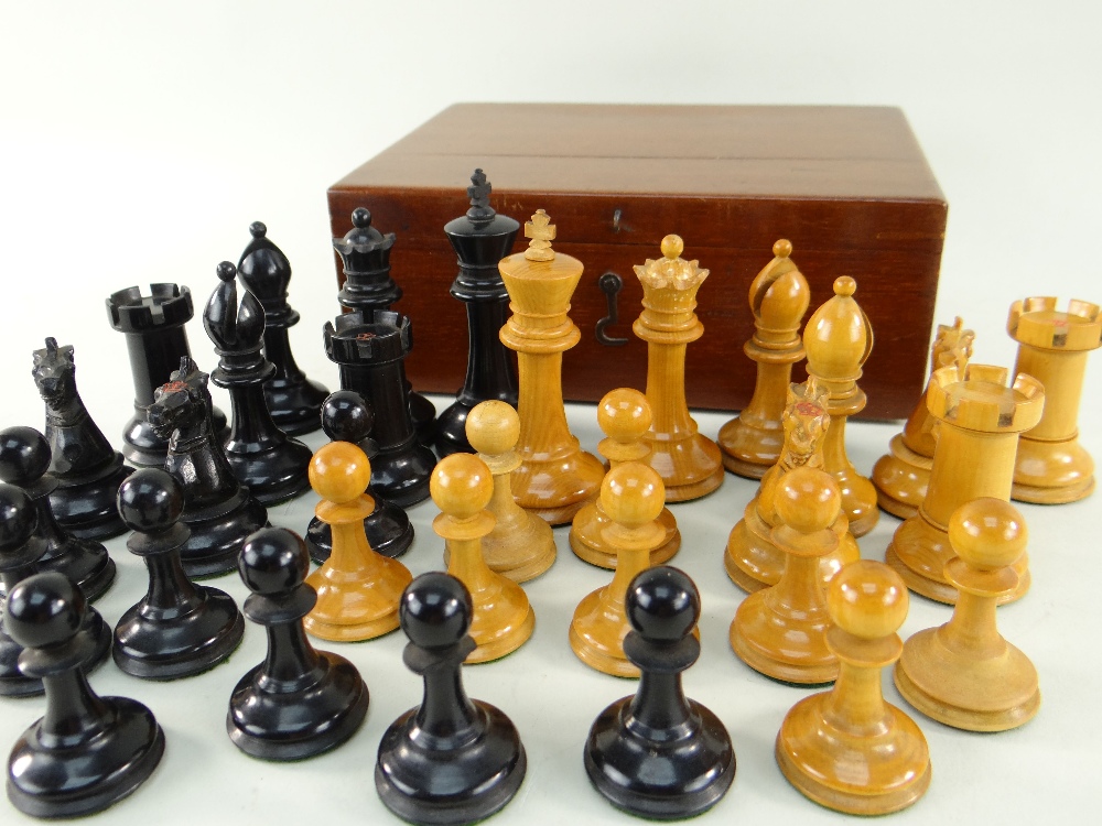 STAUNTON PATTERN CHESS SET, boxwood and ebony, rooks and knights with red stamped crowns
