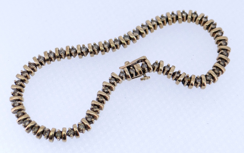 9CT GOLD DIAMOND SET BRACELET, 20cms long, 15.6gms Condition Report: No stones appear missing.