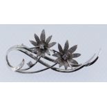 WHITE METAL DIAMOND SET FLORAL BROOCH, 7.9gms Condition Report: Hallmarks rubbed. Appears in good
