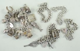 ASSORTED SILVER BRACELETS comprising two silver charm bracelets with various charms and three silver