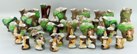 COLLECTION OF WITHERNSEA POTTERY 'FAUNA' SPILL VASES, each modelled with a woodland animal (30)