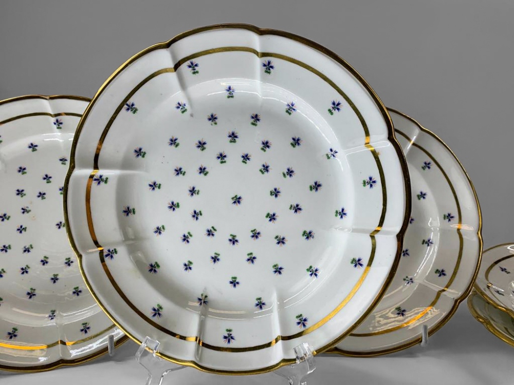 A MATCHING SET OF SIX SWANSEA PORCELAIN CRUCIFORM CIRCULAR DISHES painted with regularly spaced