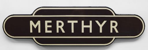 A BRITISH RAIL'TOTEM' ENAMEL SIGN FOR MERTHYR TYDFIL in typical brown, cream and black livery, of