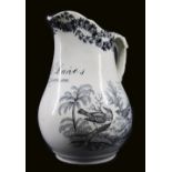 A SWANSEA POTTERY NAMED JUG FOR D DAVIES SWANSEA of bellied form and moulded handle in rare black