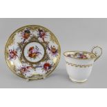 A NANTGARW PORCELAIN CUP & SAUCER the footed bell shaped cup with elevated loop handle, both