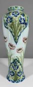 JAMES MACINTYRE FLORIAN BALUSTER VASE, c. 1908-9, by William Moorcroft, tube line decorated with
