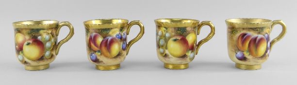 FOUR ROYAL WORCESTER PORCELAIN CABINET COFFEE CUPS, painted with plums, apples, cherries and