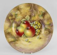 ROYAL WORCESTER PORCELAIN CABINET PLATE, painted with apples and grapes by John Smith with gilt rim,