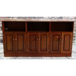 MODERN MAHOGANY NARROW SIDEBOARD, moulded top above three open shelves and three cupboards, 200 x