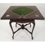 EDWARDIAN MAHOGANY ENVELOPE CARD TABLE, baize interior with gilt tooled leather border, copper