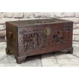 CHINESE CAMPHORWOOD CHEST, carved allover with figures in landscapes and warriors on horseback, 98 x