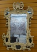 ANTIQUE ROCOCO-REVIVAL WALL MIRROR, overpainted with marginal mirrors to the corners, 116 x 80cms