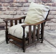 ARTS AND CRAFTS OAK LIBRARY CHAIR, slatted sides and reclining back, turned front supports, striped