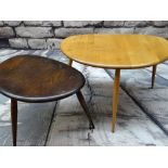 TWO ERCOL 'PEBBLE' OCCASIONAL TABLES, larger in pale elm, 65cms wide; smaller in dark elm, 50cms