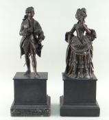 PAIR OF LATE 19TH CENTURY FRENCH PATINATED BRONZE FIGURES of aristocratic 18th Century Lady and