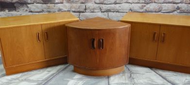 THREE G-PLAN TEAK LOW CUPBOARDS, including a pair of side cupboards 81cm wide, and a corner