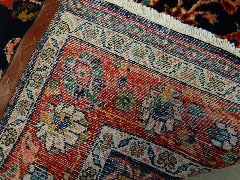 TABRIZ-STYLE RUG, red medallion on an indigo field with caramel and pink spandrels, red palmette - Image 3 of 3