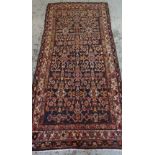SAROUK REGION RUNNER, allover geometric floral field in russet and grey-blue, ivory border,