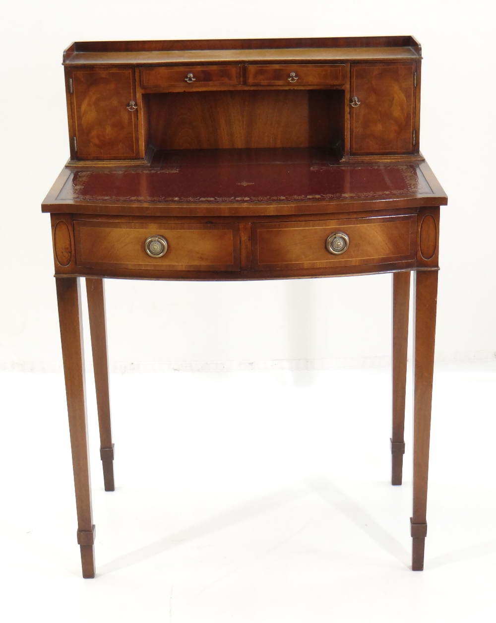 GEORGE III-STYLE MAHOGANY BONHEUR DU JOUR, stationary cupboards, and frieze drawers, inset tooled