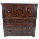CHARLES II OAK GEOMETRIC TWO-PART CHEST, dentil incised frieze above deep panelled drawer on a