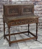 EARLY 20TH CENTURY CARVED OAK BONHEUR DU JOUR, upper cupboard section with fitted interior of pigeon