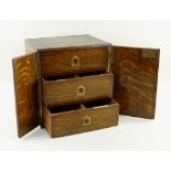 EDWARDIAN OAK THREE-DRAWER TABLE CABINET, fitted deep drawers with flush handles, similar side
