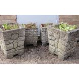 TWO PAIRS OF SQUARE COMPOSITION STONE PLANTERS, 37cms and 46cms high respectively (4)
