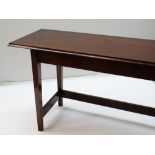 MODERN MAHOGANY NARROW SIDE OR SERVING TABLE, moulded top on square tapering legs tied by three