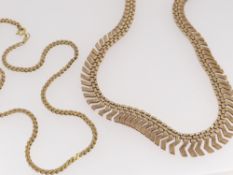 TWO 9K GOLD NECKLACES, one a fringe necklace with graduated brick and Z-links, 25.6g, and an S-