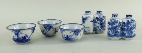 TWO CHINESE BLUE & WHITE PORCELAIN DOUBLE SNUFF BOTTLES, each painted with mountainous landscapes,