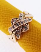 YELLOW METAL DIAMOND CROSS OVER RING, ring size K, 6.4gms, in black square ring box Condition