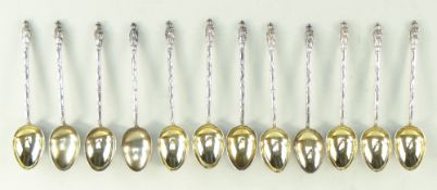 SET OF TWELVE CHINESE SILVER COFFEE SPOONS, Wang Hing marked WH90, with finials as Mandarins in