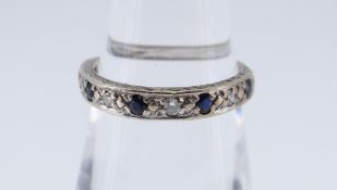 9CT WHITE GOLD DIAMOND & SAPPHIRE HALF ETERNITY RING, ring size L / M, 1.8gms, in black square