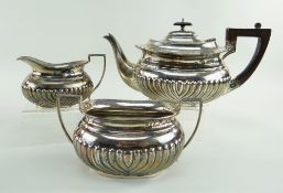 EDWARD VII SILVER OVAL THREE-PIECE TEASET, BIRMINGHAM 1902, MAKER L&S, with half gadrooned oval
