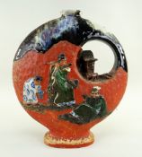 JAPANESE SUMIDA GAWA POTTERY MOON VASE, modelled with a small cottage and three Daoist immortals,
