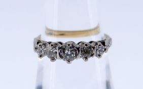 18CT GOLD FIVE STONE DIAMOND RING, the old European cut graduating stones totalling 0.4cts overall