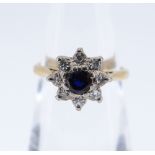 18CT GOLD SAPPHIRE & DIAMOND STAR SET RING, ring size K, 3.4gms, in burgundy sqaure ring box