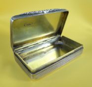 MID 19TH CENTURY SILVER SNUFF BOX of rectangular form with engraving to lid 'Presented