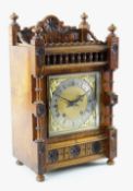 EARLY 20TH CENTURY ARTS & CRAFTS-STYLE OAK MANTEL CLOCK with silvered Roman chapter ring and applied
