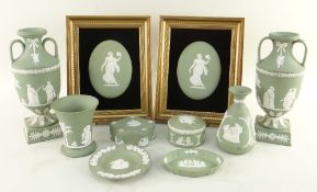 COLLECTION OF WEDGWOOD GREEN JASPER CERAMICS including two oval plaques, pair of classical urns
